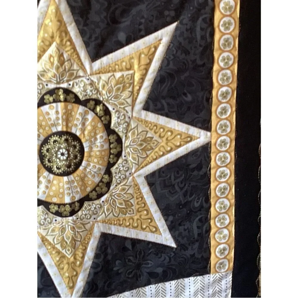 NWT. Gold and Black Star Lap Quilt